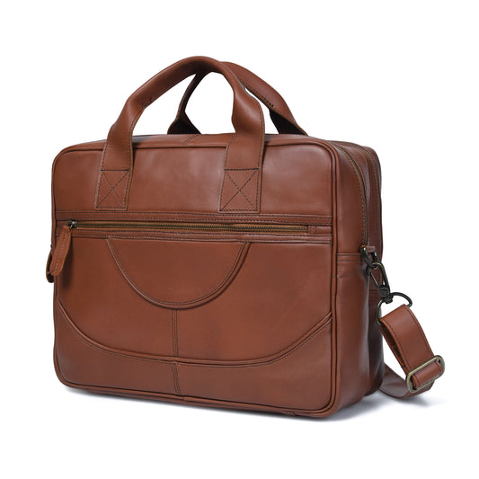 Cuiravo Aldric chestnut leather briefcase, angled front view showing deep profile and exterior zip pockets