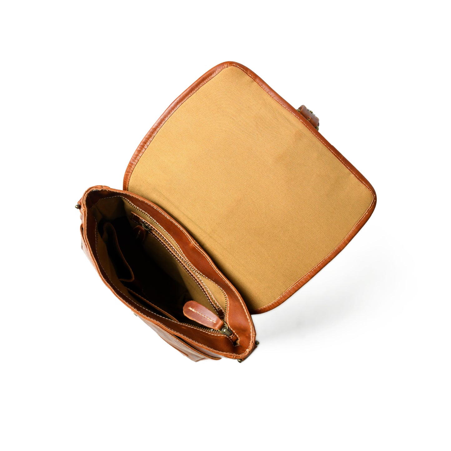 Open waxed buffalo leather crossbody bag showing the lined interior and storage compartments