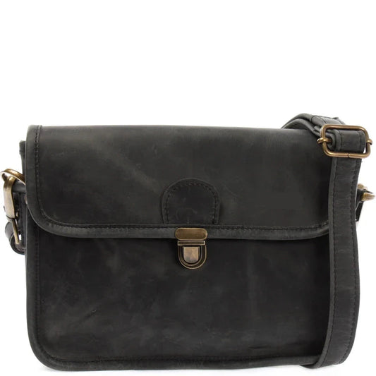 Charcoal gray Vela waxed leather shoulder bag, front view with flap closure, brass-tone clasp, and adjustable strap