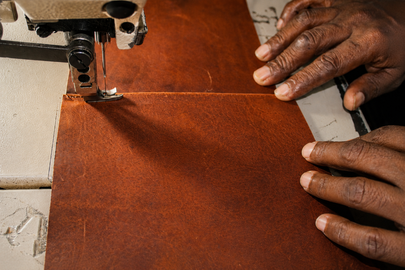 Leather artisan working at a Cuiravo partner workshop in Kanpur, India