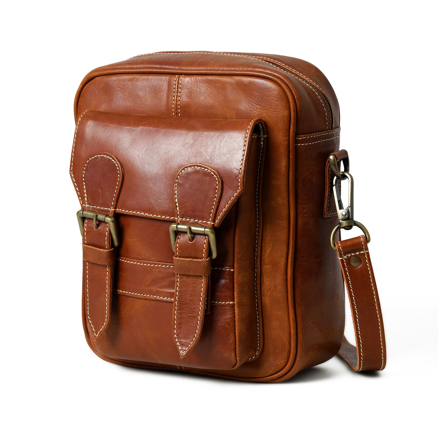 Waxed buffalo leather crossbody bag in an angled front view with handles and hardware
