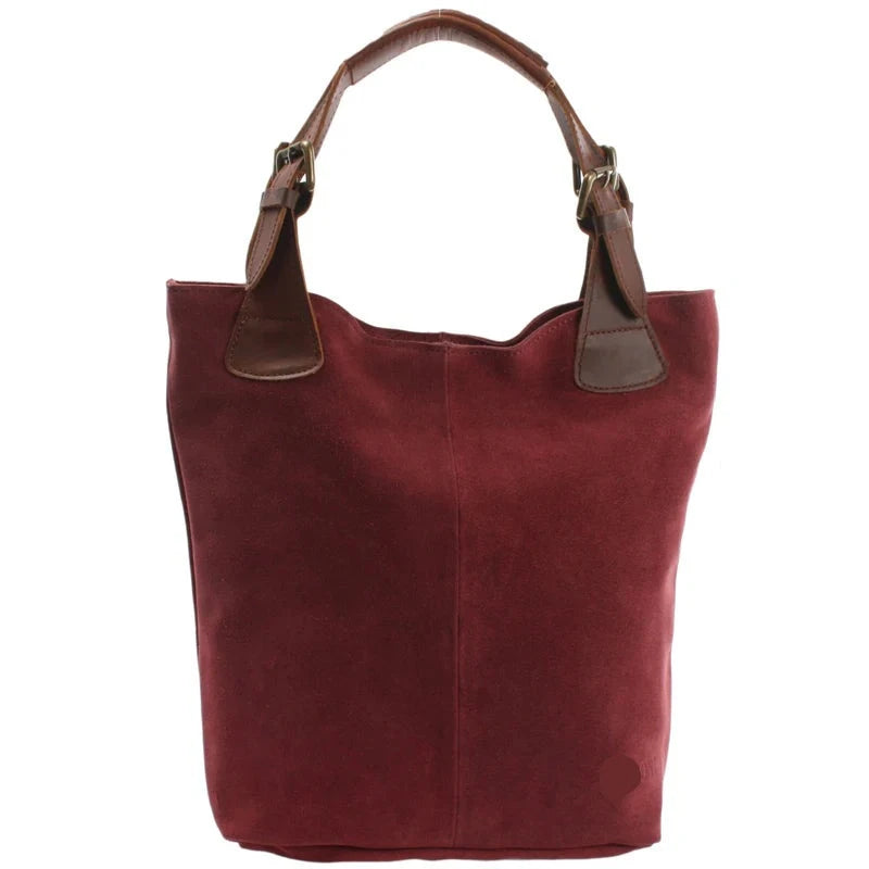 Burgundy suede Amara shopper, front view with brown leather handles and antique brass hardware