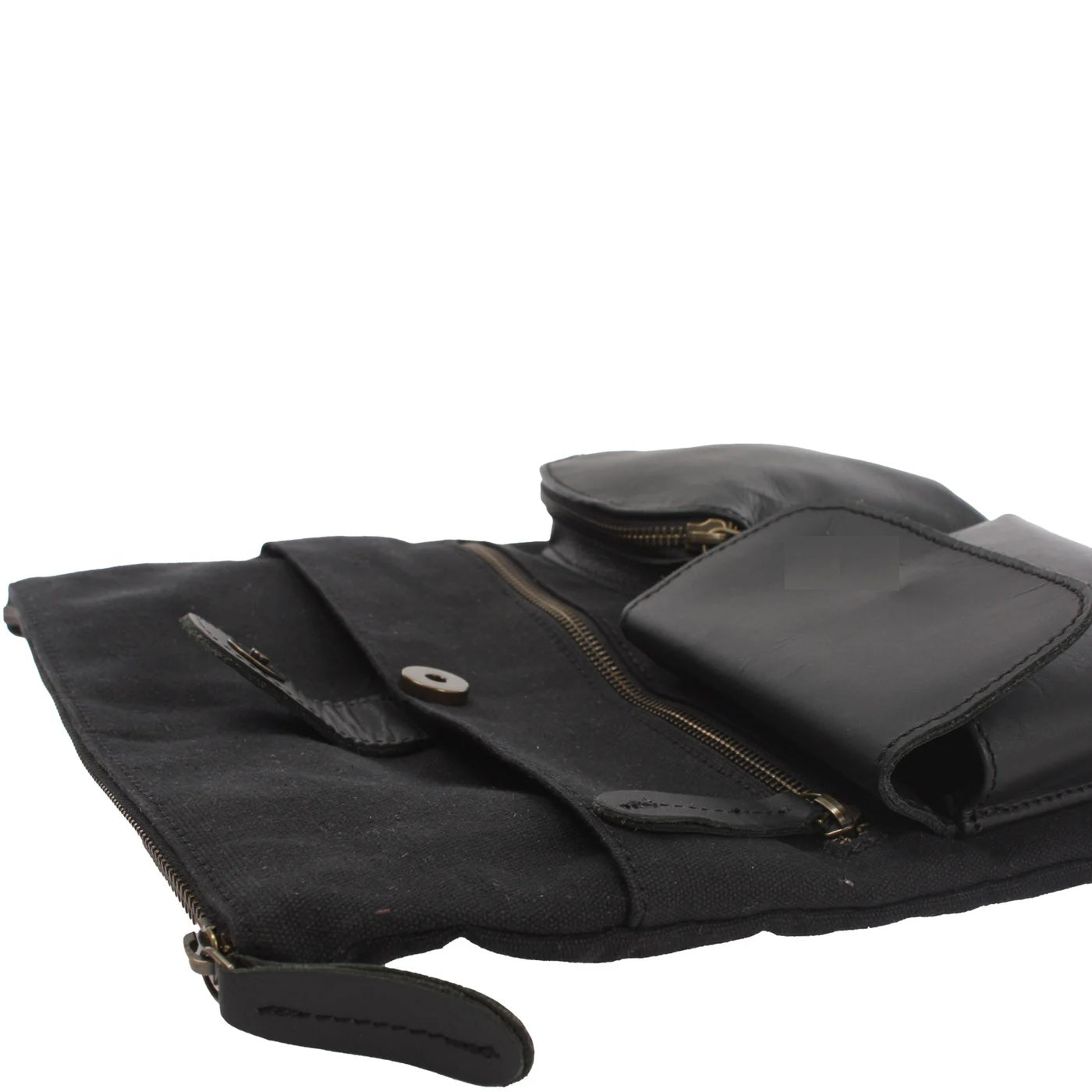 Black Arden crossbody bag laid flat, showing magnetic front pocket, zip pocket, and cowhide leather pouches