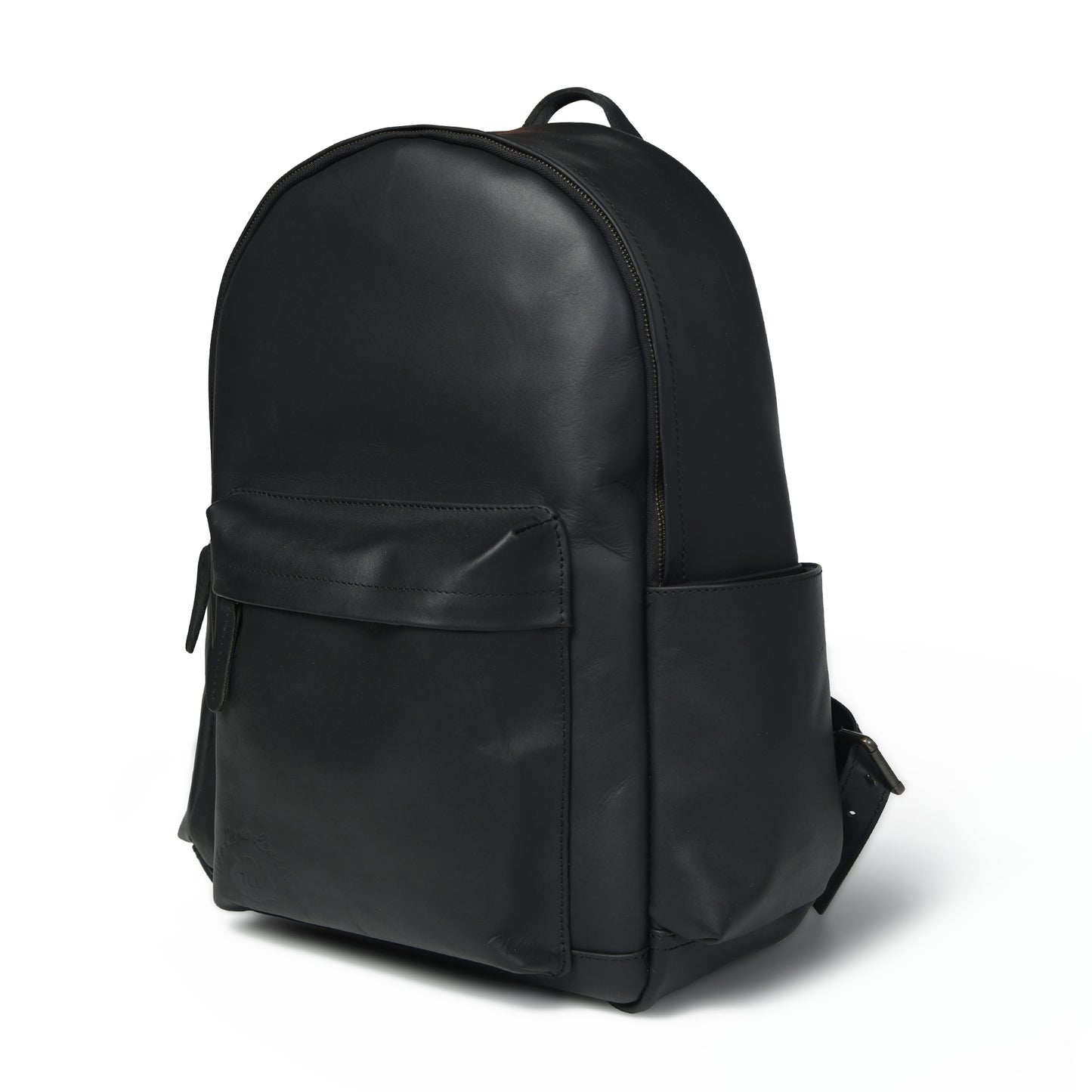 Black Atlas waxed leather backpack, angled front view showing side pocket, top handle, and zip opening