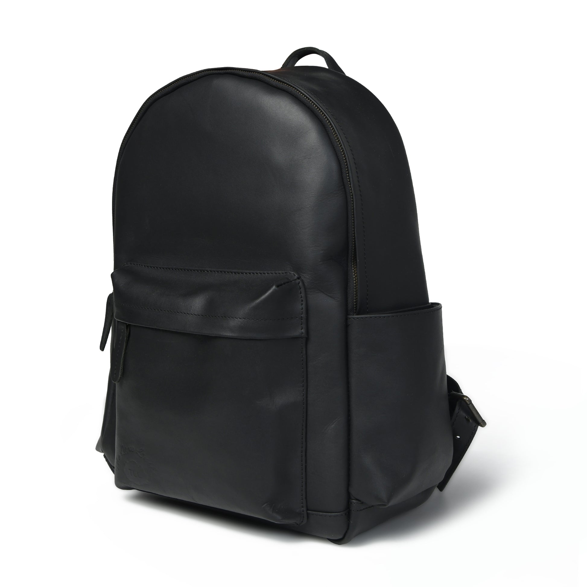 Black Atlas waxed leather backpack, angled front view showing side pocket, top handle, and zip opening