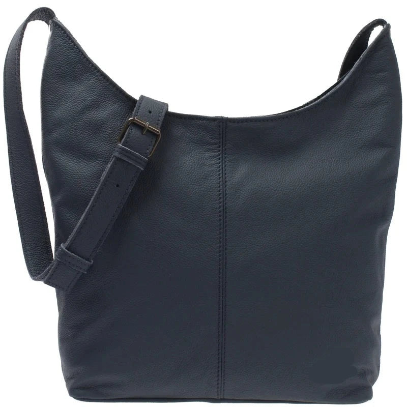 Dark navy Aveline buffalo leather shoulder bag, front view with curved top and adjustable buckle strap