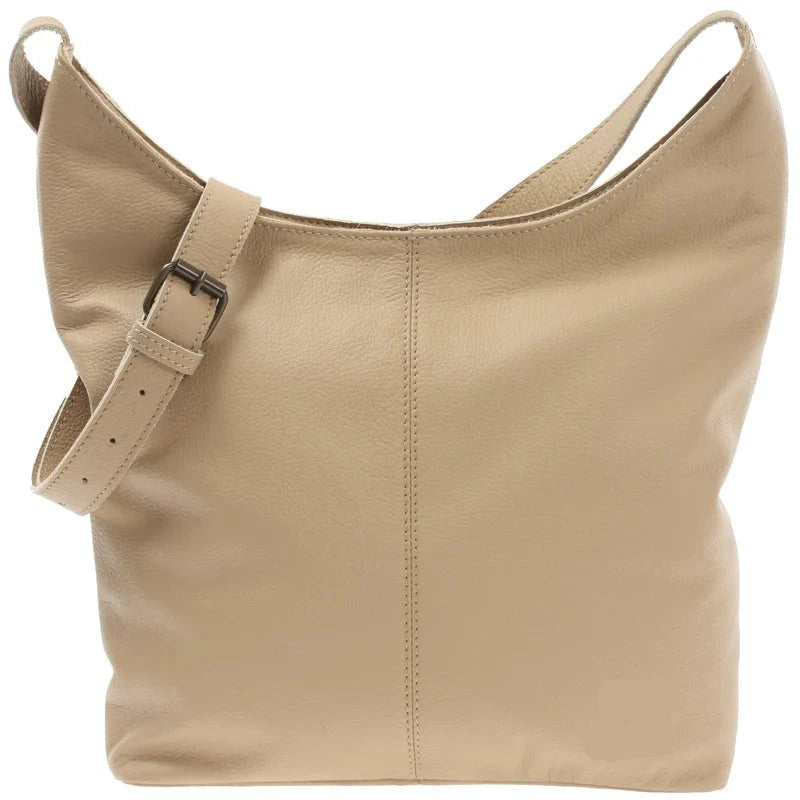 Sand beige Aveline buffalo leather shoulder bag, front view with center seam and adjustable buckle strap