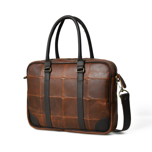 Waxed leather laptop briefcase in an angled front view with handles and hardware