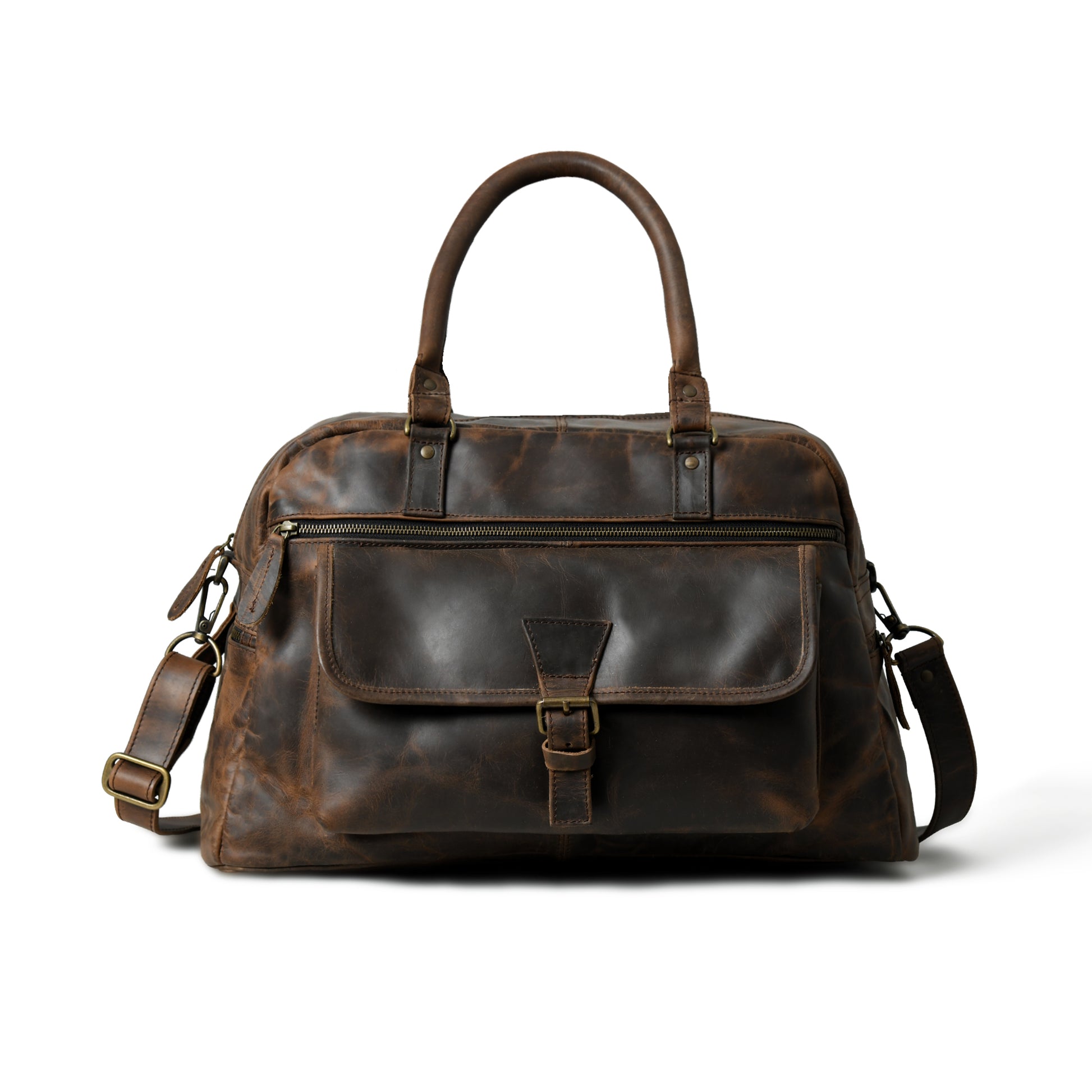 Waxed Cow Leather weekender duffel with refined hardware, front product view. A dark brown distressed leather duffel bag with top handles, a front flap pocket with a buckle closure, and a detachable shoulder strap, shown on a white background.