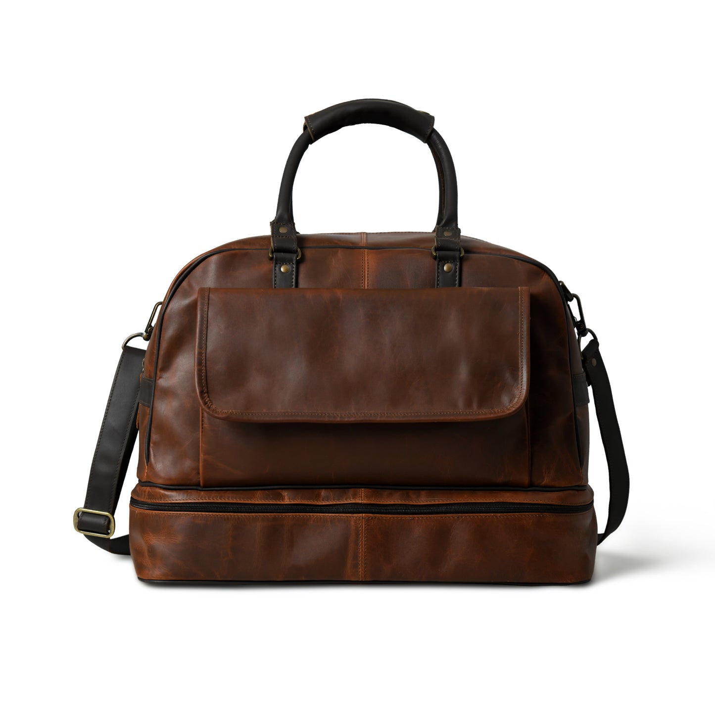 A brown leather duffel bag with a top handle, a front flap pocket, and a detachable shoulder strap, photographed on a clean white background.
