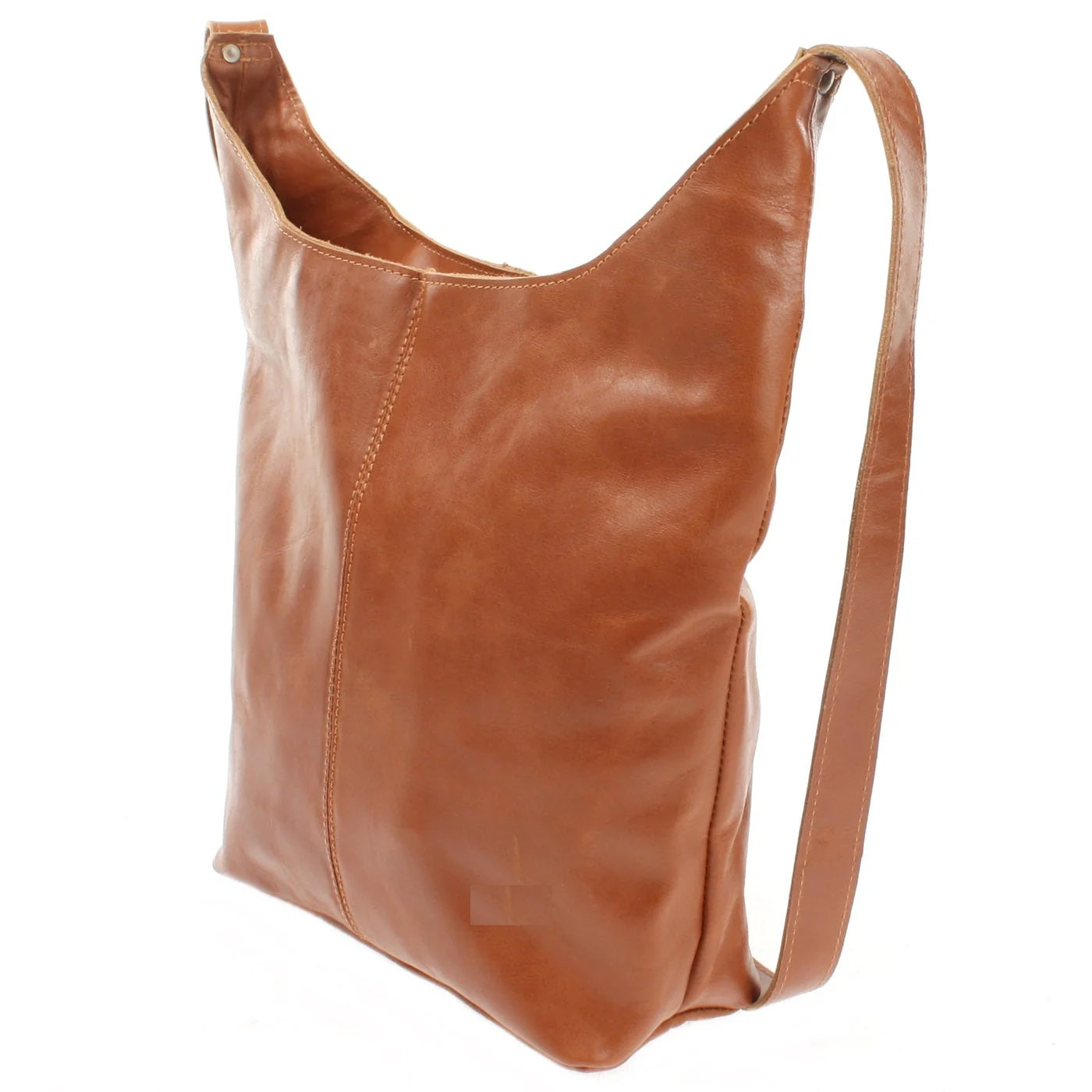 Cognac Elaine leather shoulder bag, angled view showing curved silhouette and long strap