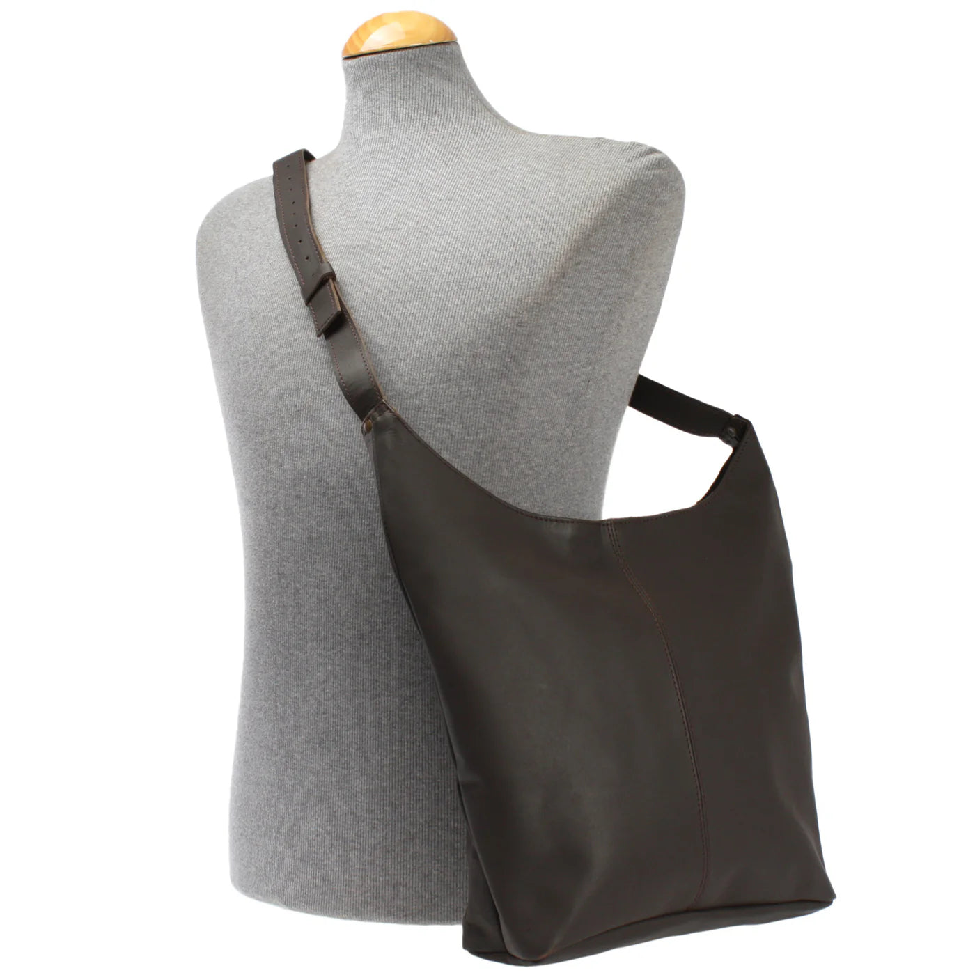 Dark brown Elaine leather shoulder bag worn on a mannequin, showing size and adjustable strap
