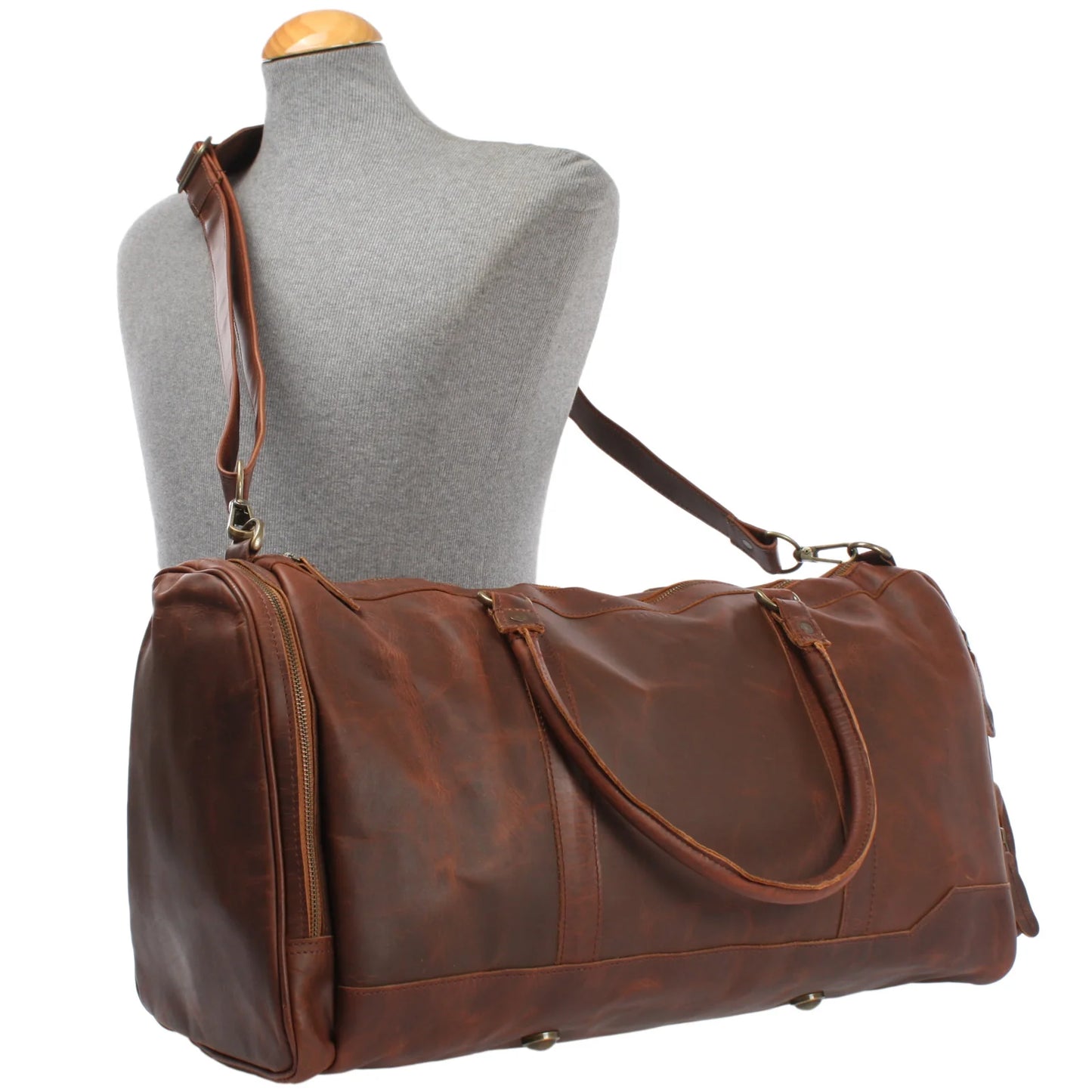 Brown Heritage weekender duffel displayed on a mannequin with adjustable shoulder strap