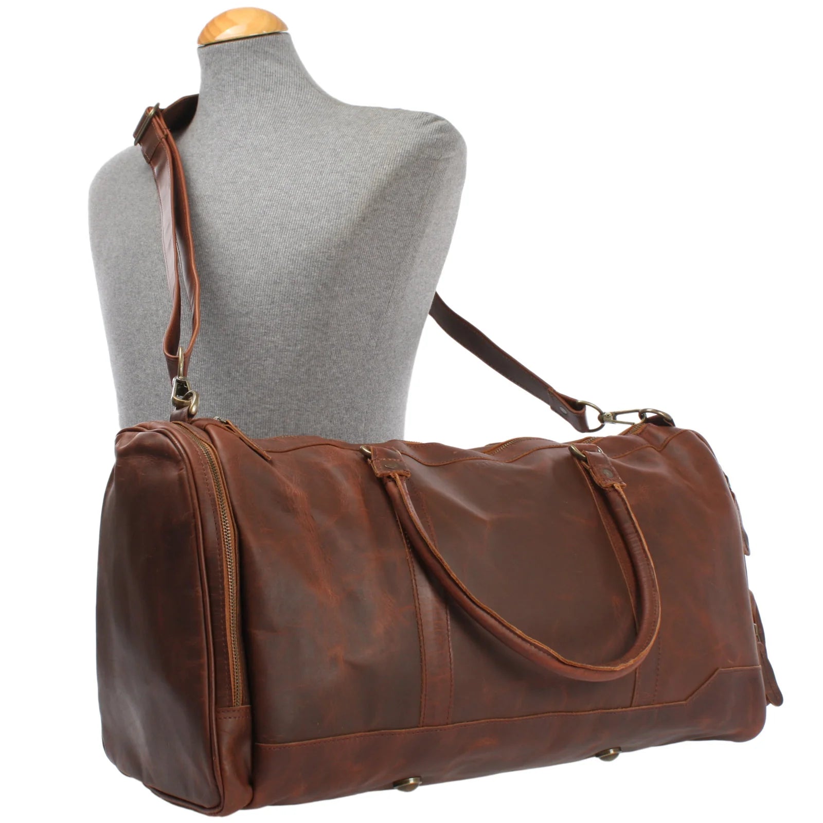 Brown Heritage weekender duffel displayed on a mannequin with adjustable shoulder strap