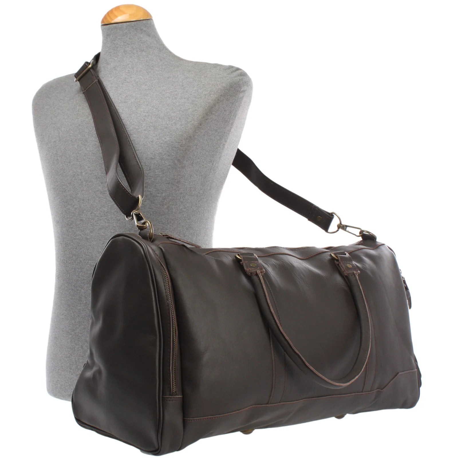 Dark brown Heritage weekender duffel displayed on a mannequin with adjustable shoulder strap