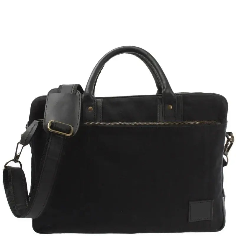 Black canvas and cowhide trolley briefcase, front view with padded shoulder strap and horizontal zip pocket