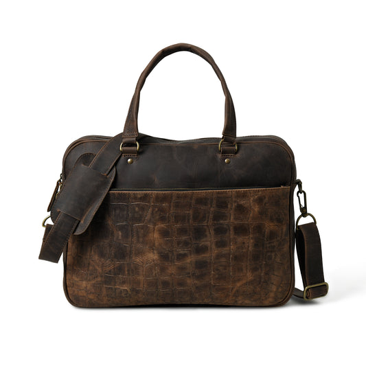 Front view of waxed leather laptop briefcase showing pockets, closure, and hardware