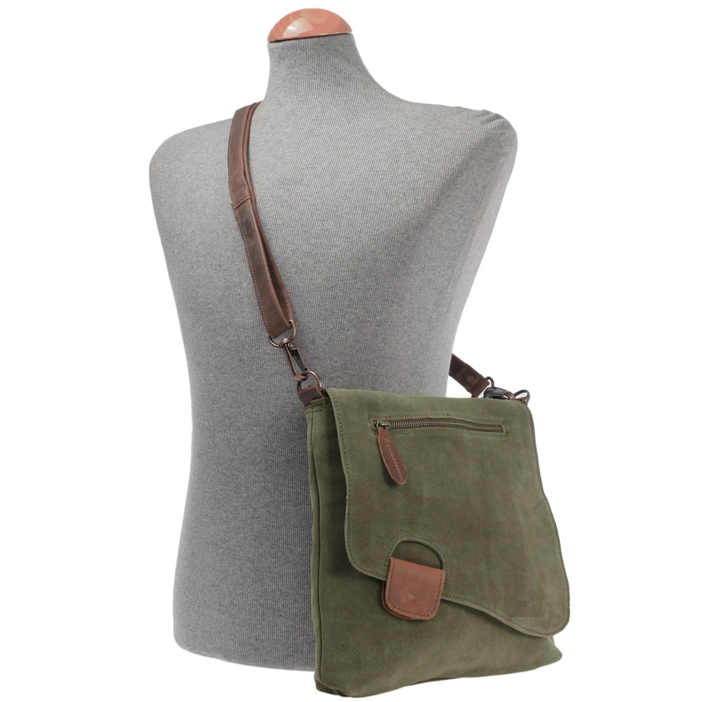 Olive green Mira suede and leather bag worn crossbody on a mannequin, showing size and adjustable strap
