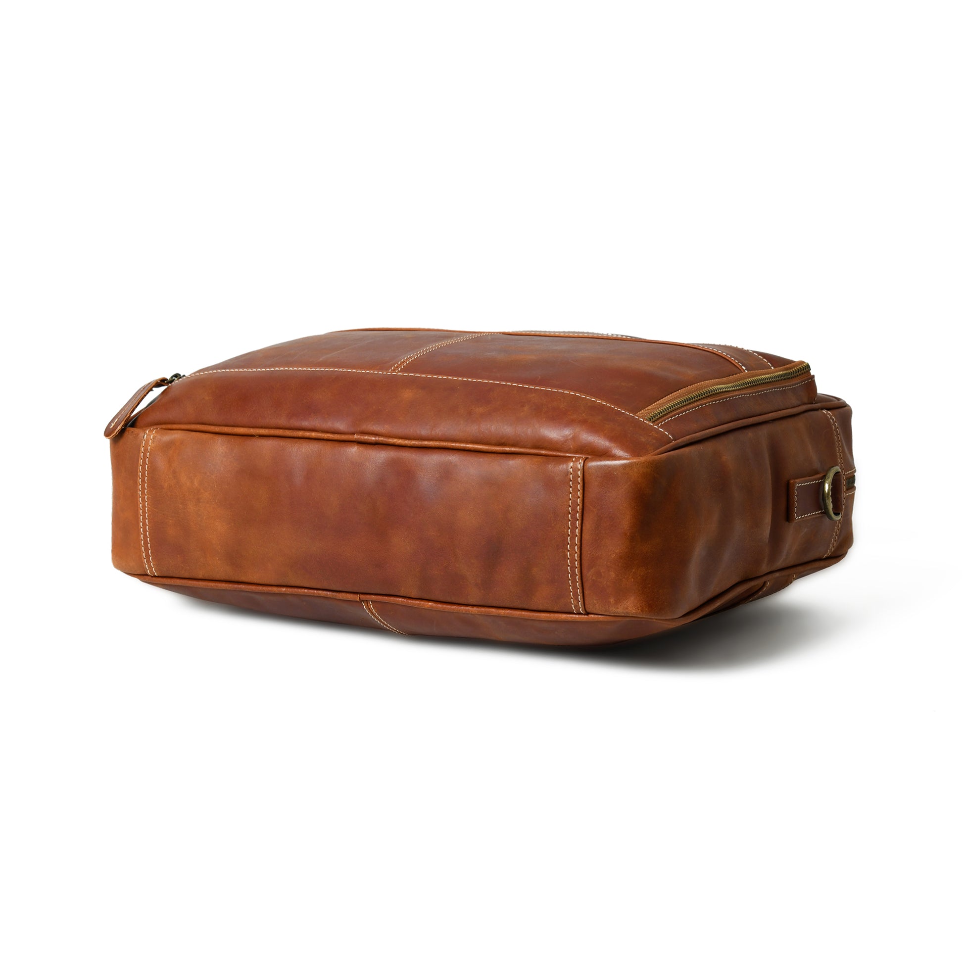 Bottom view of waxed buffalo leather laptop briefcase showing the reinforced base and edge stitching