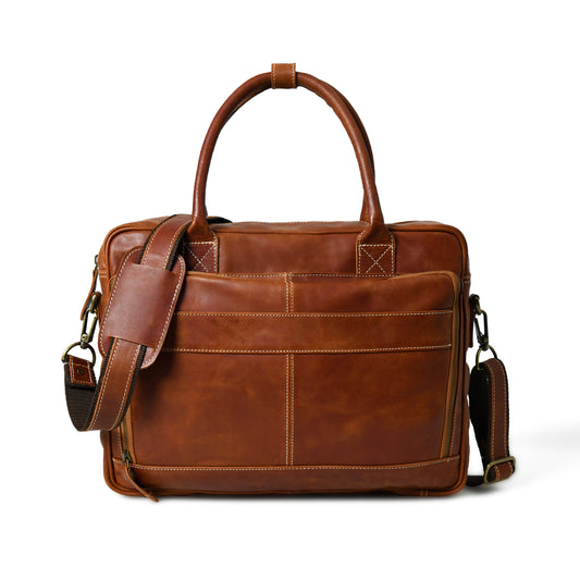 Front view of waxed buffalo leather laptop briefcase showing pockets, closure, and hardware