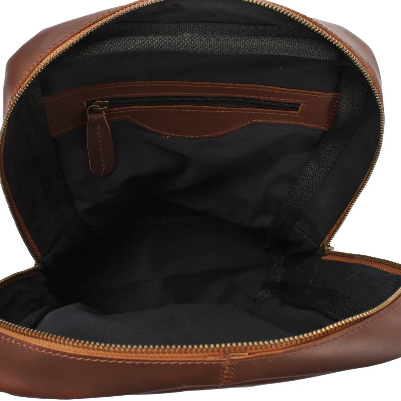 Open gray Rowan backpack showing dark fabric lining and interior zipper pocket