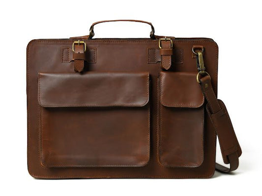 Front view of waxed leather laptop briefcase showing pockets, closure, and hardware