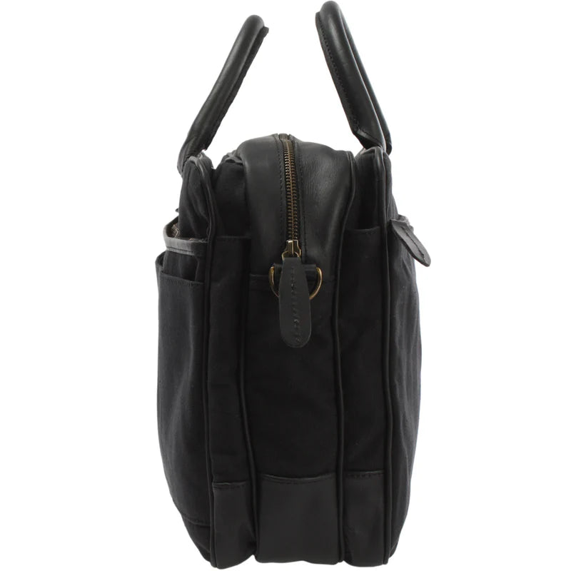Black canvas and cowhide briefcase side view showing gusseted depth, leather trim, and brass-tone zipper