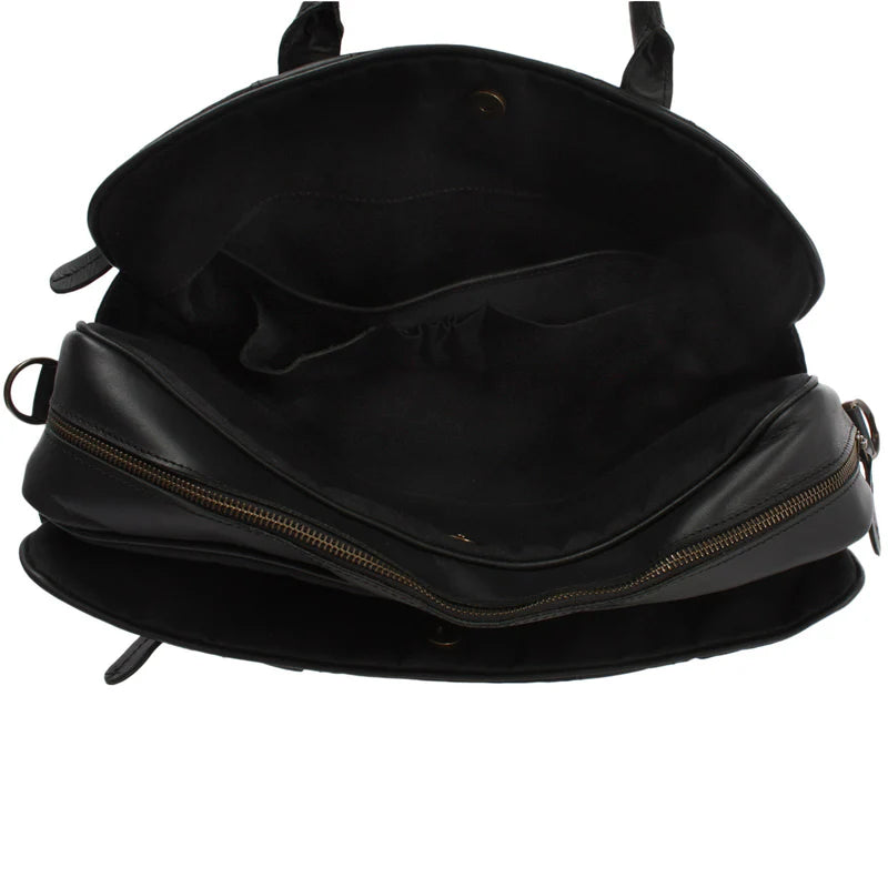 Open black canvas and cowhide briefcase showing organizer pockets, divided compartments, and brass-tone zippers