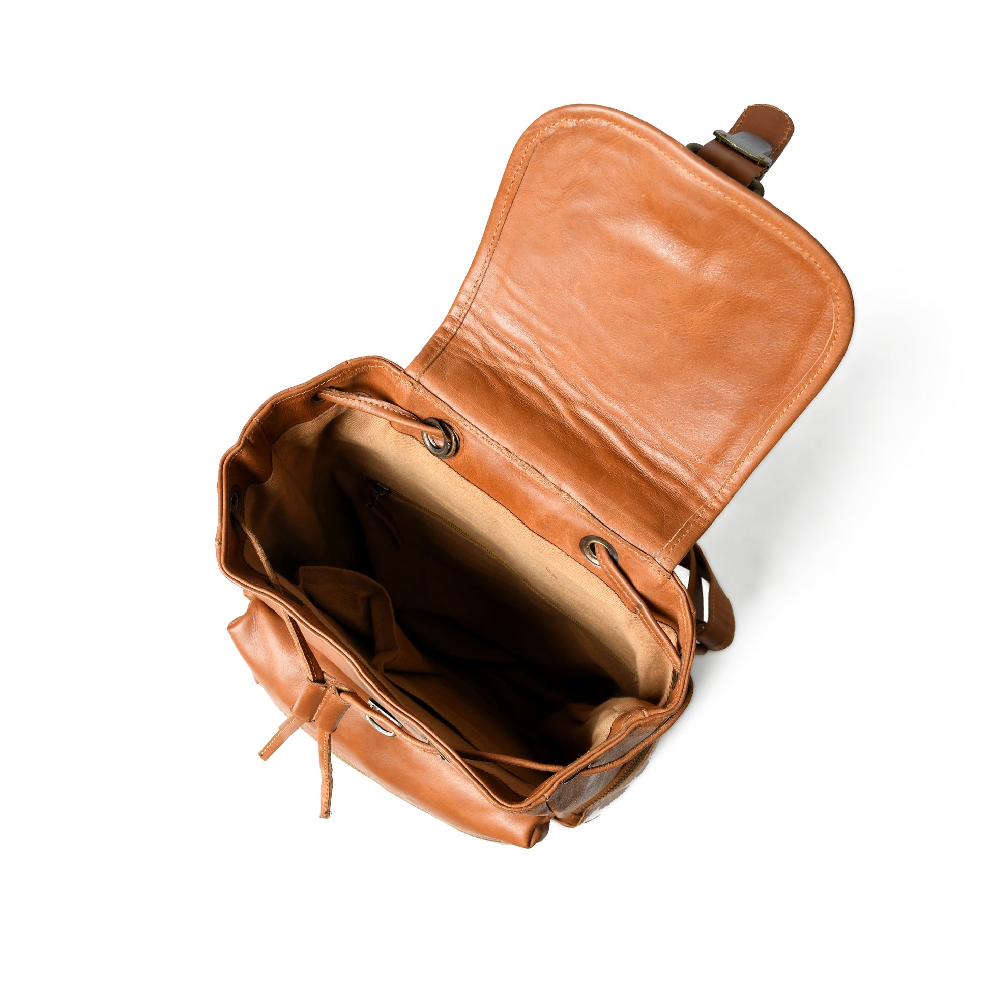 Open Vivian leather backpack showing tan lining, drawstring opening, interior zip pocket, and main compartment