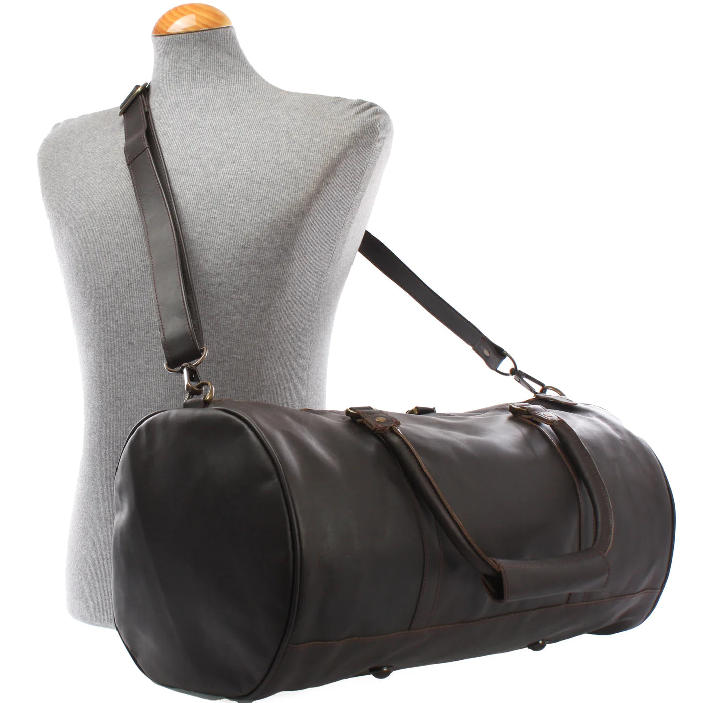 Gray Voyager leather weekender duffel displayed on a mannequin with detachable shoulder strap