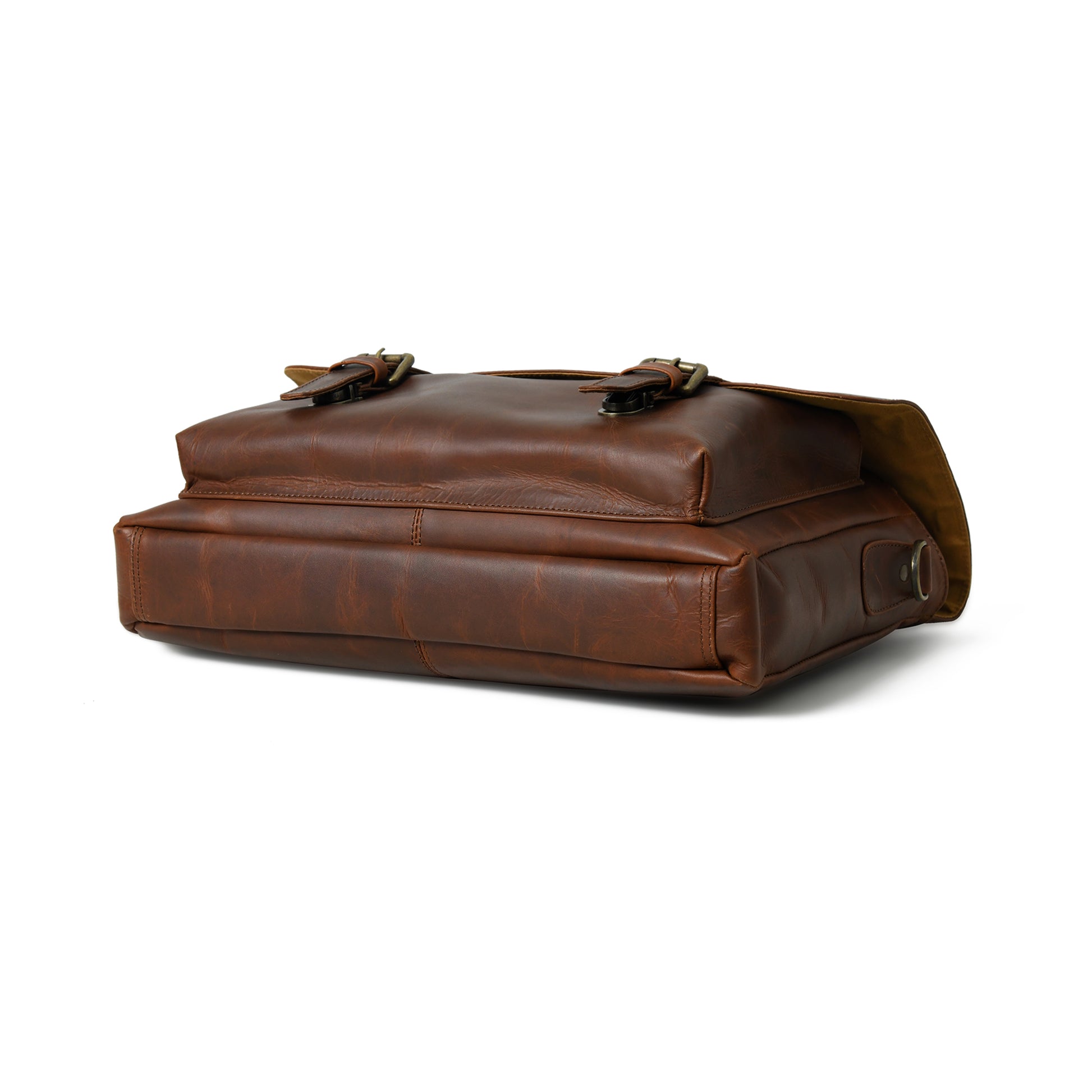 Bottom view of waxed leather laptop briefcase showing the reinforced base and edge stitching