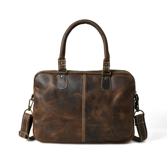 Front view of waxed leather laptop briefcase showing pockets, closure, and hardware