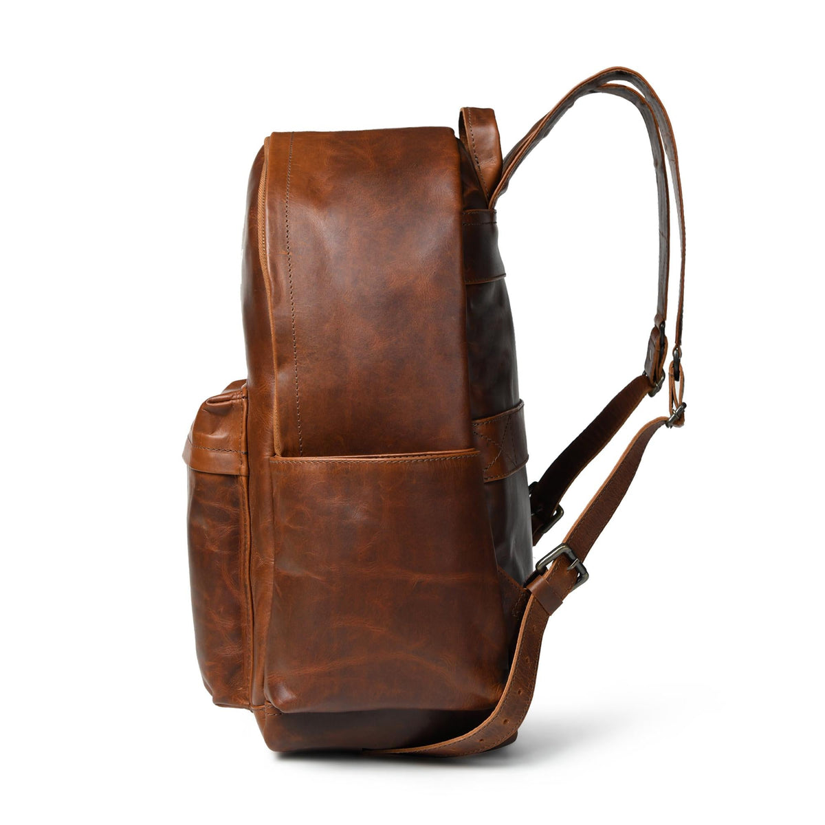 Brown full-grain leather Cuiravo Atlas laptop backpack, side view showing depth and profile
